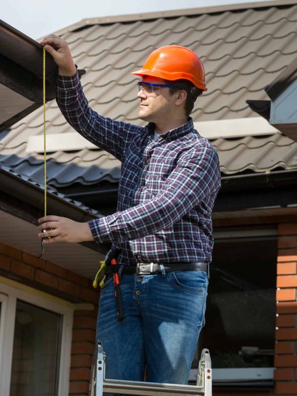 professional-worker-measuring-height-of-roof-with-tape.jpg professional-worker-measuring-height-of-roof-with-tape.jpg